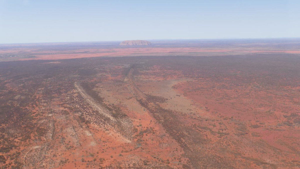 Uluru in the distance
